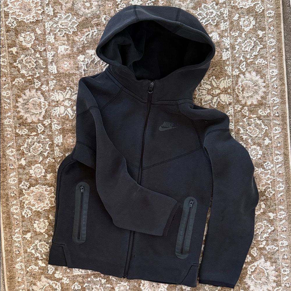 Kids Nike Tech black hoodie.